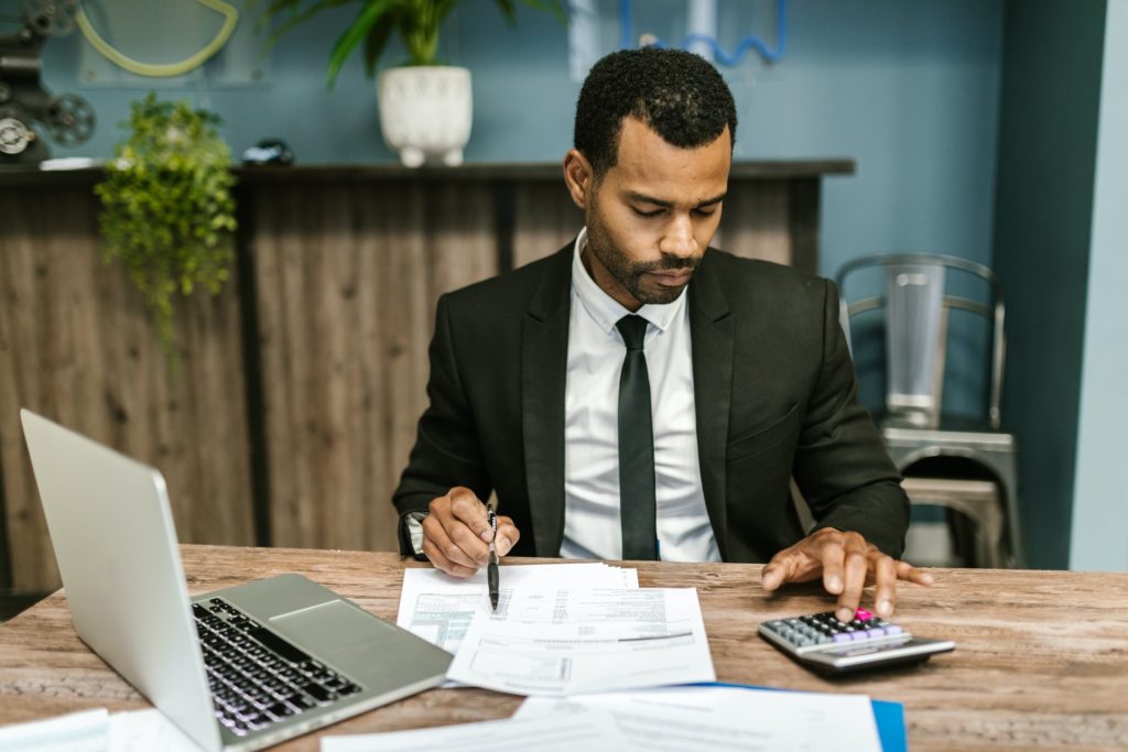 A competent and professional accountant in a black suit