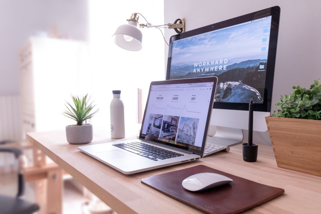 A neat office with all papers digitally stored on the laptop