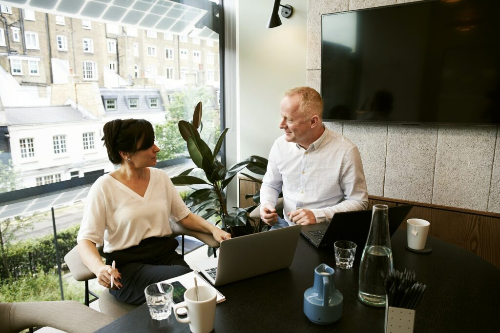 two employees setting up an accounting system