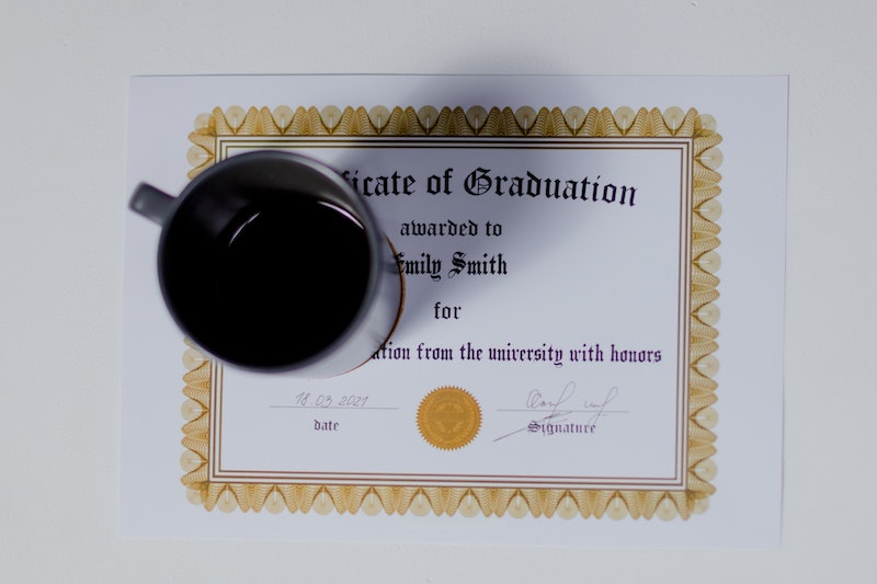Cup of coffee on certificate