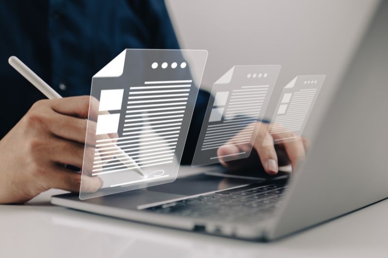 man signing digital document