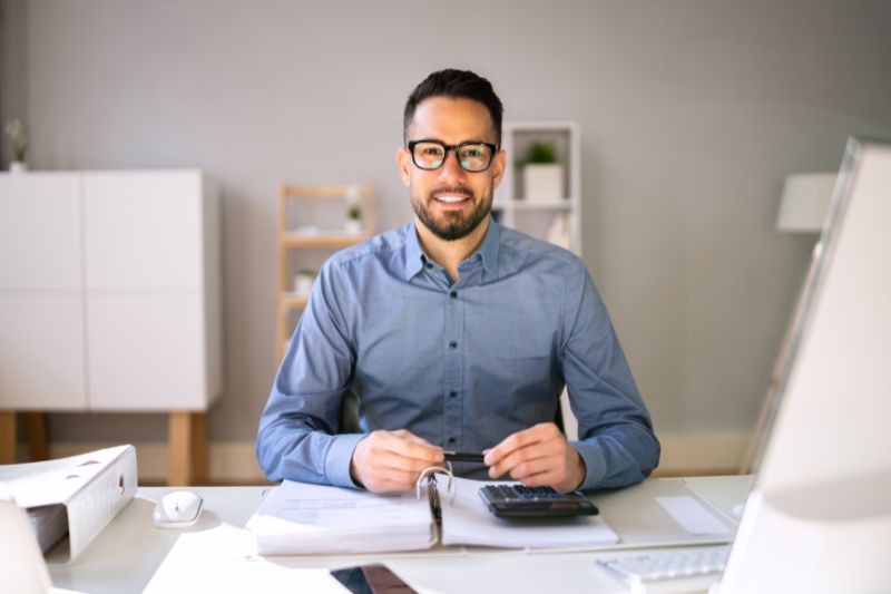 Business owner performing bookkeeping