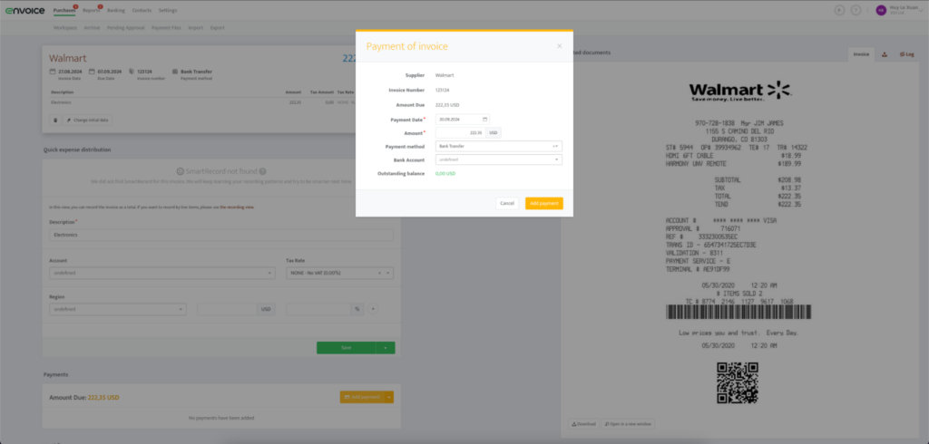 A screenshot of an invoice processing software interface showing a payment form, digital receipt from Walmart and other invoice details.